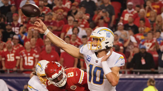 Sep 15, 2022; Kansas City, Missouri, USA; Los Angeles Chargers quarterback Justin Herbert (10) throws against the Kansas City Chiefs during the second half at GEHA Field at Arrowhead Stadium. Mandatory Credit: Denny Medley-USA TODAY Sports